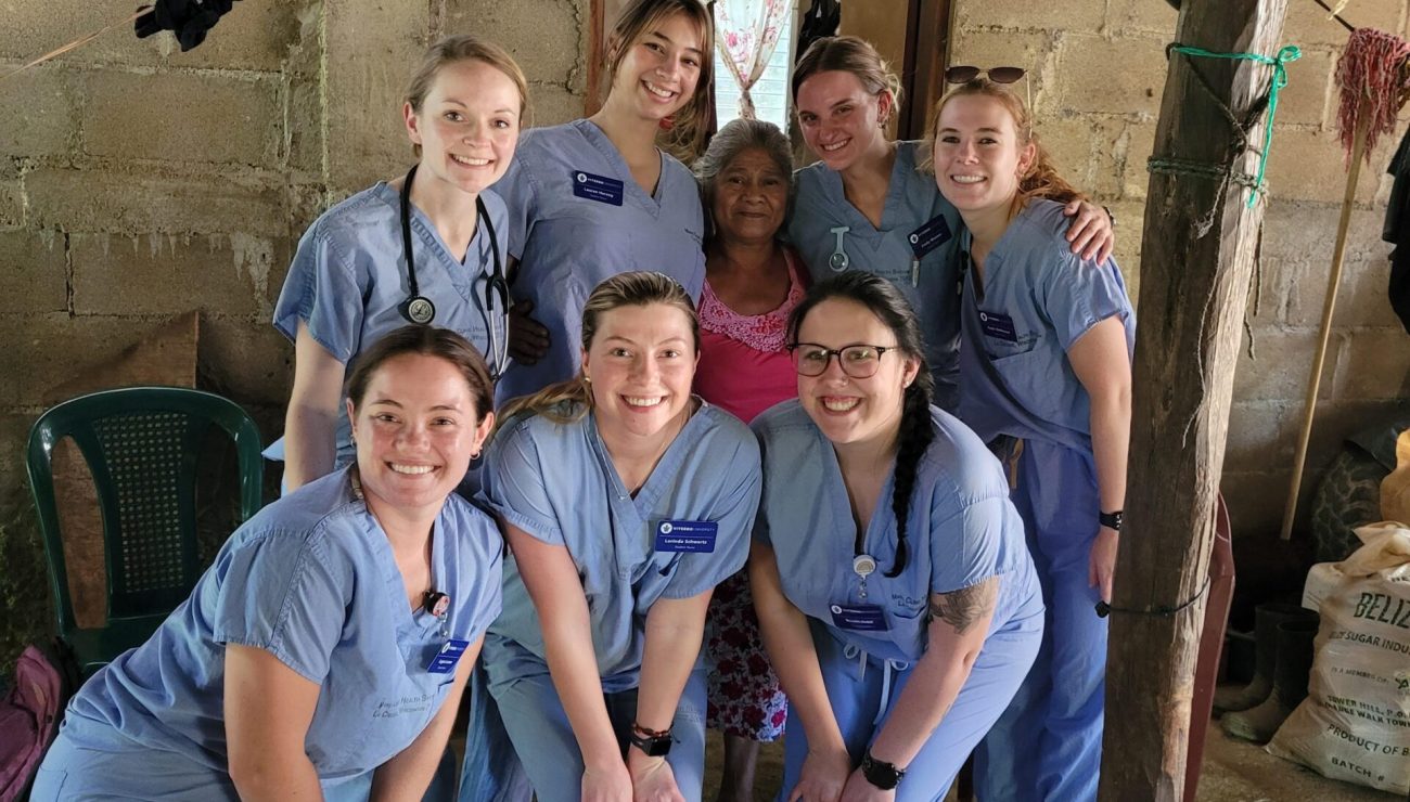 Group of nursing study abroad students pose for group photo